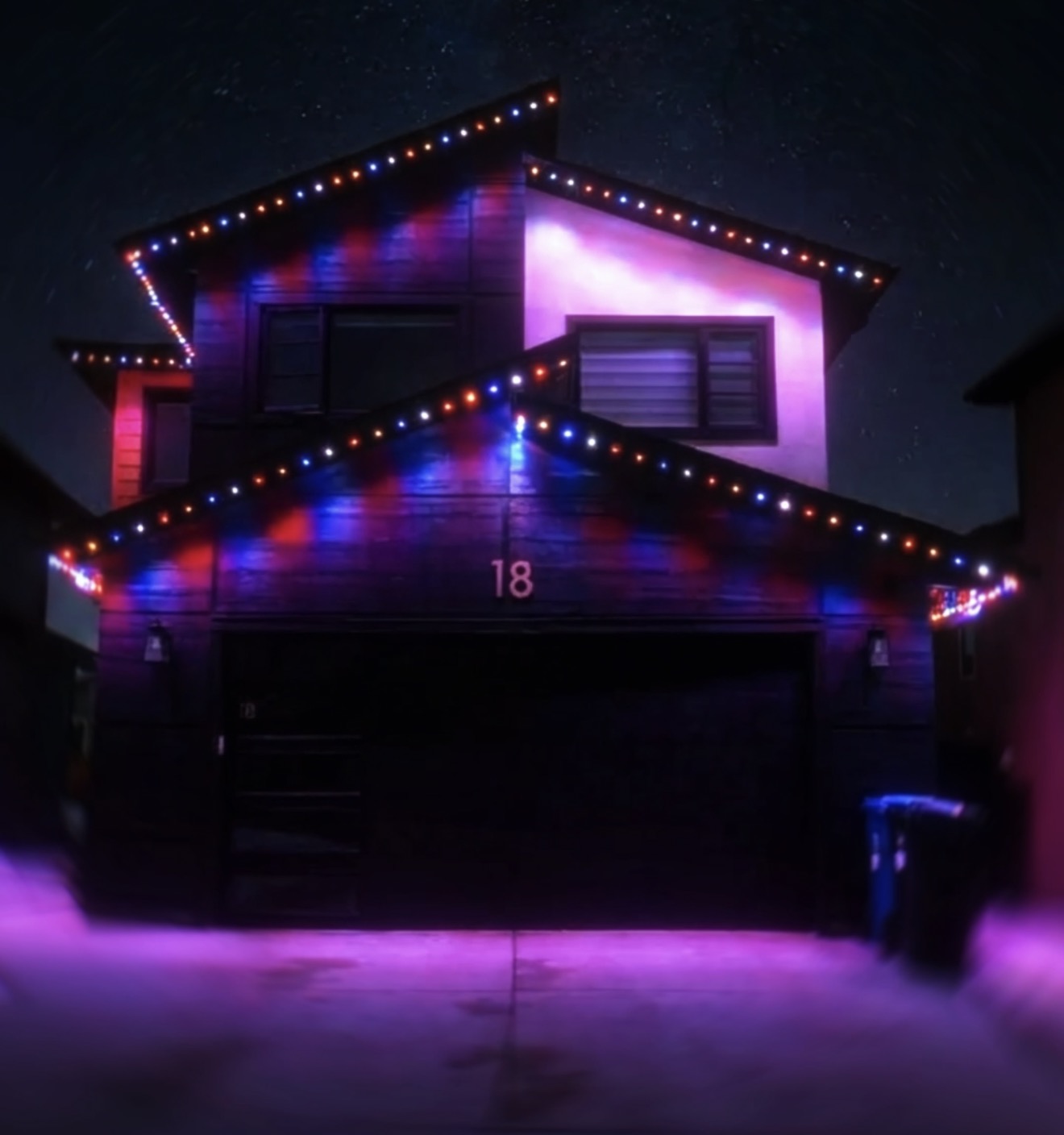 Blue accent lighting on residential roofline